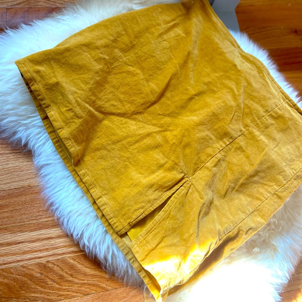 Mustard mini skirt- never been worn, but washed